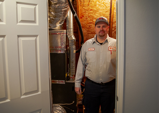 Tulsa Tech graduate Shawn Schubert tackles a cool new career in the world of heating and air.