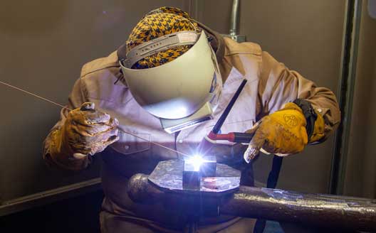 Tulsa Tech Welding student works on a project
