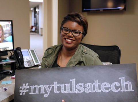 One Stop representative holding sign #myTulsaTech